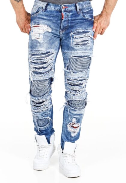 Ripped Denim Jeans Cool jeans in a stone-washed denim, bestowing a roughly rugged look. Shredded edges and backcloth with patterned denim or red fabric. The denim have a classic fit with three pockets at the front and two pockets at the back.