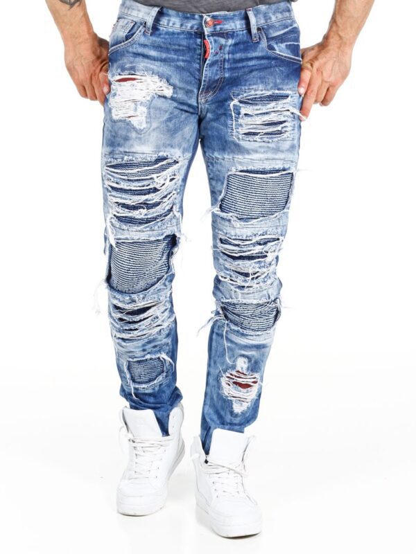 Ripped Denim Jeans Cool jeans in a stone-washed denim, bestowing a roughly rugged look. Shredded edges and backcloth with patterned denim or red fabric. The denim have a classic fit with three pockets at the front and two pockets at the back.