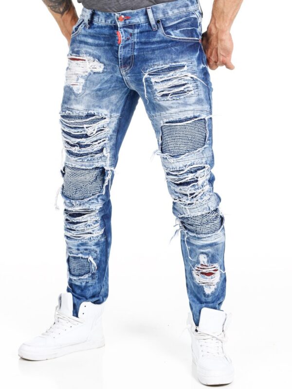 Ripped Denim Jeans Cool jeans in a stone-washed denim, bestowing a roughly rugged look. Shredded edges and backcloth with patterned denim or red fabric. The denim have a classic fit with three pockets at the front and two pockets at the back.