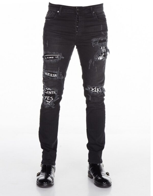 Canvas Patch Denim Crafted from high-quality and durable cotton denim to ensure the comfort for you. Described with black patches used as canvas having text on them. The highly rugged texture making a statement that's loud and clear – you embrace the rough and raw side of life.